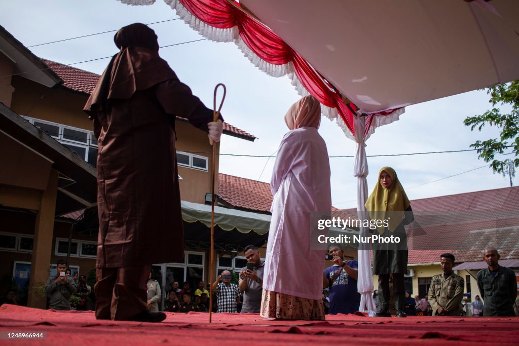 Shariya A woman is seen receiving caning for violating sharia law in... News ...