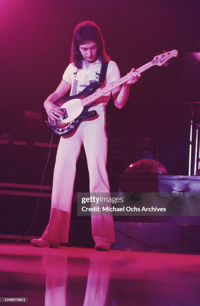English Bass Guitarist John Deacon Of The Rock Band Queen In Concert english-bass-guitarist-john-deacon-of-the-rock-band-queen-in-concert