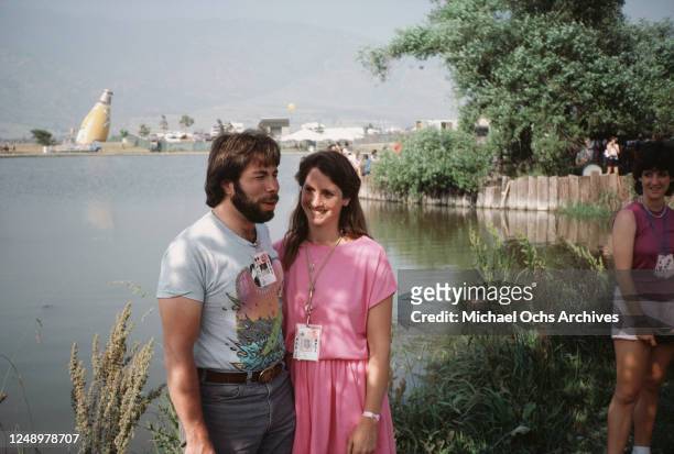 American computing entrepreneur Steve Wozniak with his wife, slalom canoeist Candice Clark at the US Festival in the Glen Helen Regional Park,...