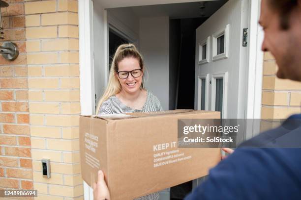 next day delivery - passing giving stock pictures, royalty-free photos & images