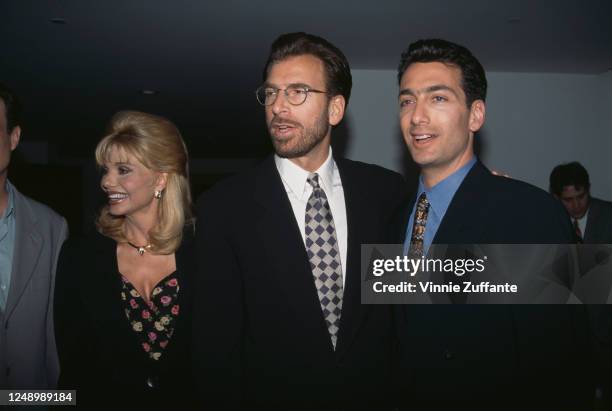 American actress Loni Anderson, American businessman Edgar Bronfman Jr, and American businessman Matthew Bronfman attend the Perfumes Isabell launch...