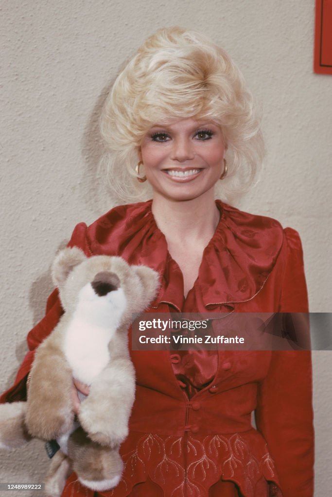 Loni Anderson Holding A Soft Toy