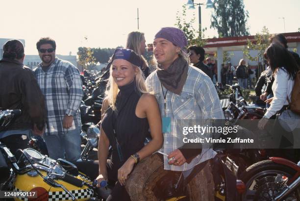 Canadian actress Pamela Anderson and American singer-songwriter Bret Michaels attend Love Ride 11, the 11th Annual Motorcycle Rider's Fundraiser for...