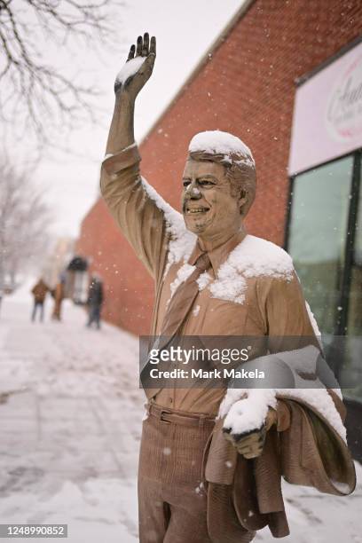 Snow covers a statue of former president Jimmy Carter on March 21, 2023 in Rapid City, South Dakota. A rare spring snow fell on the central part of...