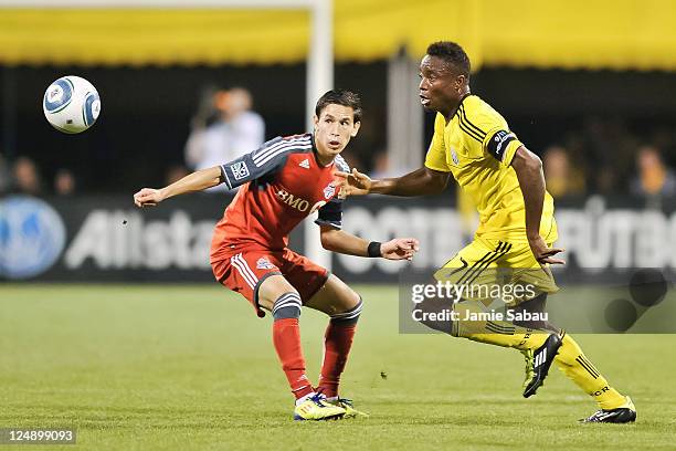 Eric Avila of Toronto FC and Emmanuel Ekpo of the Columbus Crew chase after a loose ball on September 10, 2011 at Crew Stadium in Columbus, Ohio.