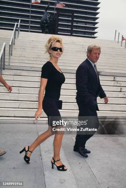 Canadian actress Pamela Anderson arriving for her breach of contract trial at Los Angeles Superior Court in Los Angeles, California, 20th May 1997.