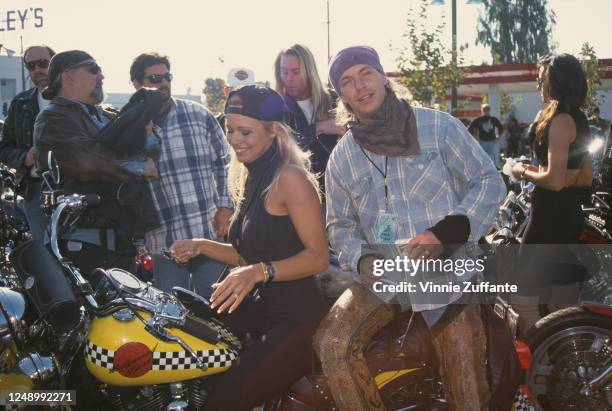 Canadian actress Pamela Anderson and American singer-songwriter Bret Michaels attend Love Ride 11, the 11th Annual Motorcycle Rider's Fundraiser for...