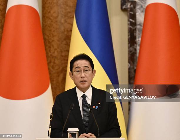 Japan's Prime Minister Fumio Kishida speaks at a joint press conference with Ukrainian President Volodymyr Zelensky after their meeting in Kyiv on...