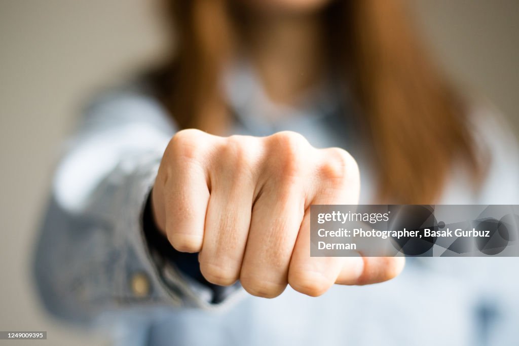 Clench Object A Woman Clenching Fist High-Res Stock Photo - Getty Images
