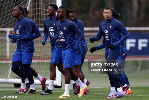 France's forward Kylian Mbappe takes part in a training session in Clairefontaine-en-Yvelines on March 21, 2023 as part of the team's preparation for...