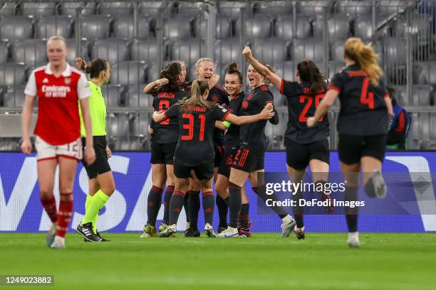 Lea Schueller of Bayern Muenchen celebrates after scoring her team's first goal with teammates during the UEFA Women's Champions League quarter-final...