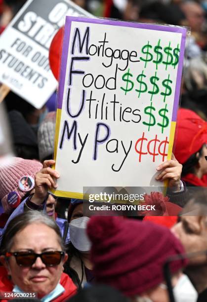 Los Angeles public school support staff, teachers, and supporters rally outside of the school district headquarters on the first day of a three day...