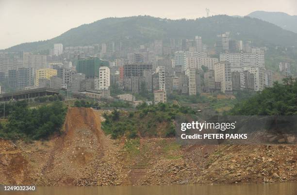 China-environment-water-Three-Gorges-dam, FEATURE by Dan MartinIn a picture taken on June 16, 2011 a landslide is seen from the water of the Yangtze...