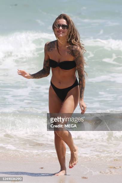 Sophia Thomalla is seen on the beach on March 21, 2023 in Miami Beach, Florida.