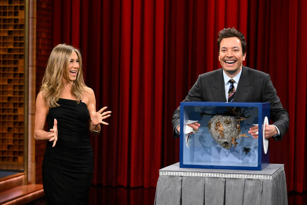 Episode 1819 -- Pictured: Actress Jennifer Aniston and host Jimmy Fallon during Can You Feel It? on Tuesday, March 21, 2023 --