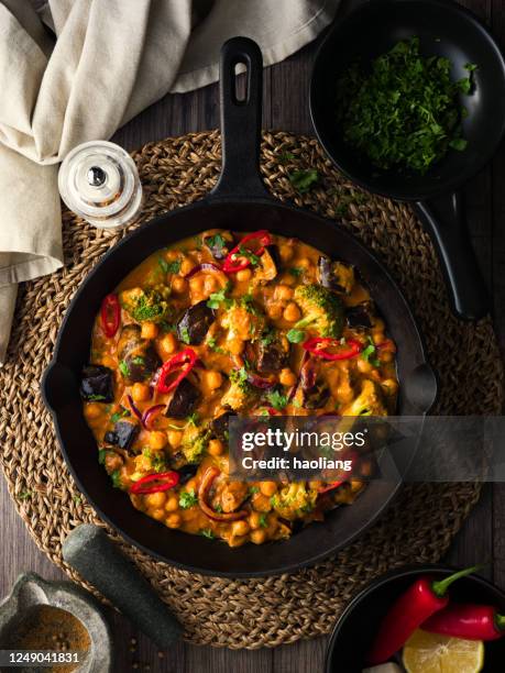 healthy vegan chickpea aubergine tikka masala - skillet stock pictures, royalty-free photos & images