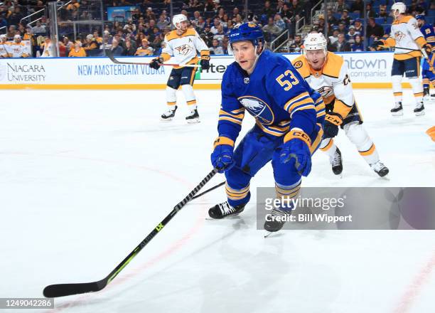 Jeff Skinner of the Buffalo Sabres skates against Tyson Barrie of the Nashville Predators during an NHL game on March 21, 2023 at KeyBank Center in...