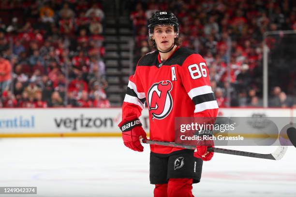 Jack Hughes of the New Jersey Devils skates in the third period of the game against the Minnesota Wild on March 21, 2023 at the Prudential Center in...