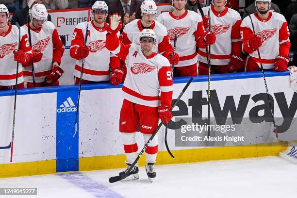 David Perron of the Detroit Red Wings acknowledges the crowd after a tribute video from the St. Louis Blues at the Enterprise Center on March 21,...