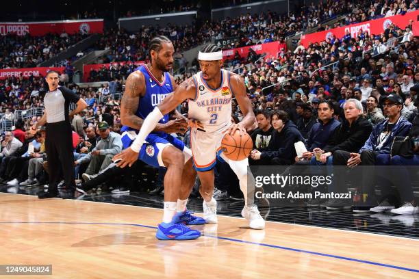 Shai Gilgeous-Alexander of the Oklahoma City Thunder dribbles the ball during the game against the LA Clippers on March 21, 2023 at Crypto.Com Arena...