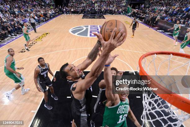 Trey Lyles of the Sacramento Kings rebounds the ball during the game against the Boston Celtics on March 21, 2023 at Golden 1 Center in Sacramento,...