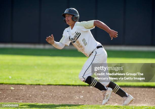 Archbishop Mitty high school shortstop Nick Yorke runs safely to second base against St. Ignatius high school during the sixth inning of their...