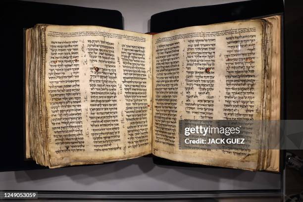 The Codex Sassoon, the earliest most complete edition of the Hebrew Bible, is pictured on March 22, 2023 at the ANU Museum of the Jewish People in...