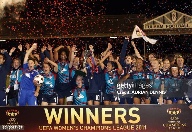 Olympique Lyonnais' celebrate after winning the UEFA Women's Champions League final football match against FFC Turbine Potsdam at Craven Cottage in...