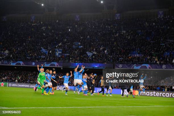 Ssc Napoli's players celebrate victory match at the end of the Champions League round of 16 football match between SSC Napoli and Eintracht...