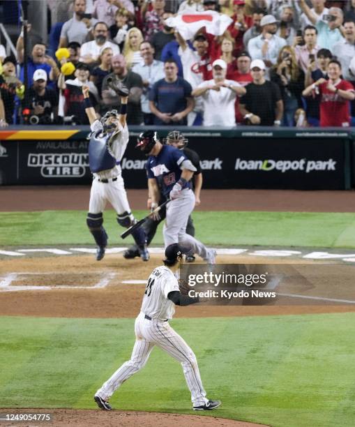 Japan pitcher Shohei Ohtani reacts after striking out Mike Trout of the United States for the final out in a World Baseball Classic final at...