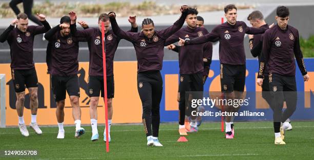 March 2023, Hesse, Frankfurt/Main: Soccer: National team, Germany before the international match against Peru. Players perform coordination exercises...