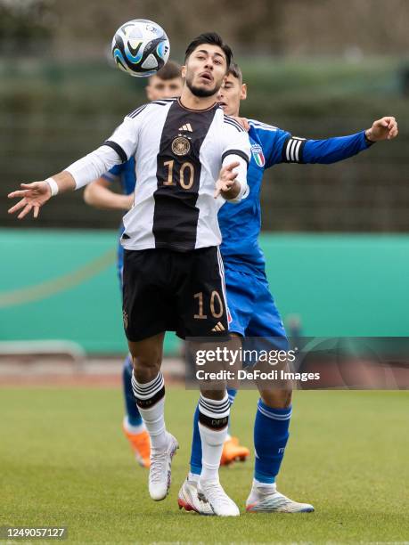 Muhammed Damar of Germany and Giacomo Faticanti of Italy battle for the ball during the UEFA European Under-19 Championship Malta 2023 qualifying...