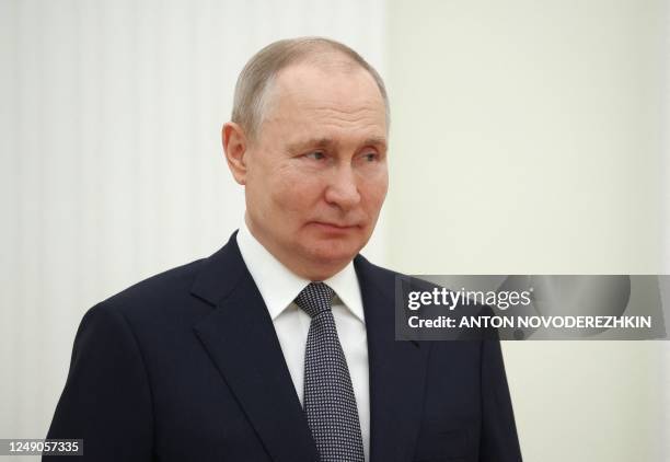 Russian President Vladimir Putin attends a ceremony to present presidential prizes for young culture professionals and writing and art for children...