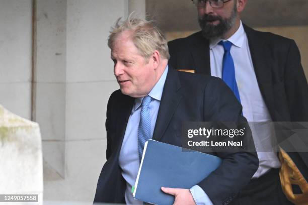 Former Prime Minister Boris Johnson walks through the Parliamentary Estate on his way to Portcullis House to give evidence on Partygate on March 22,...