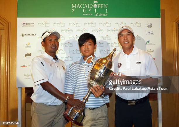 Defending champion Thaworn Wiratchant of Thailand, Amatuer golfer David Ao of Macau and two time winner Zhang Lian Wei of China pose with the winners...