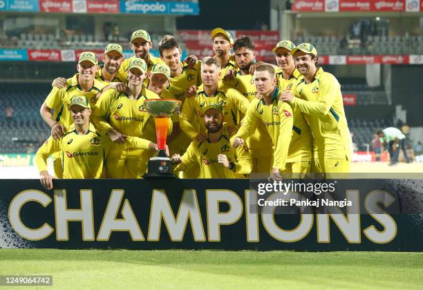 Players of Australia pose with the Series Trophy after winning 2-1 during game three of the One Day International series between India and Australia...
