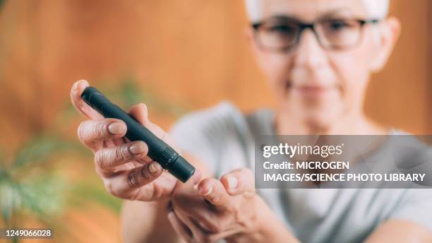 diabetes blood sugar test at home - blood sugar test stock pictures, royalty-free photos & images