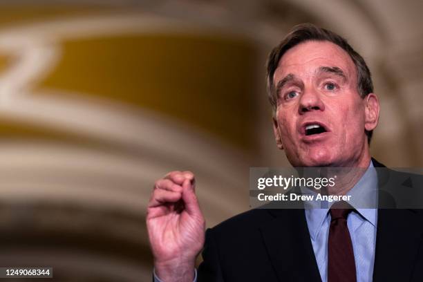 Sen. Mark Warner speaks during a news conference following a closed-door lunch meeting with Senate Democrats at the U.S. Capitol March 22, 2023 in...