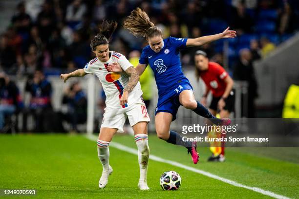 Dzsenifer Marozsan of Olympique Lyon battles for the ball with Guro Reiten of Chelsea during the UEFA Women's Champions League quarter-final 1st leg...