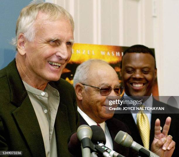 Rep. J.C, Watts, Jr looks on as former Alexandria, Virginia high school foootball coaches Bill Yoast and Herman Boone discuss the Walt Disney...