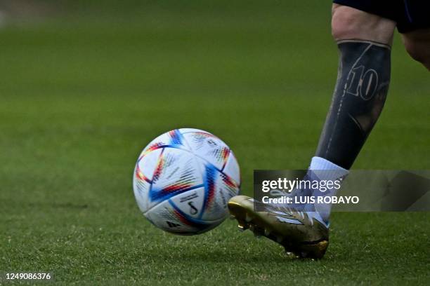 Argentina's forward Lionel Messi controls the ball during a training session in Ezeiza, Buenos Aires province, on March 22 ahead of the friendly...