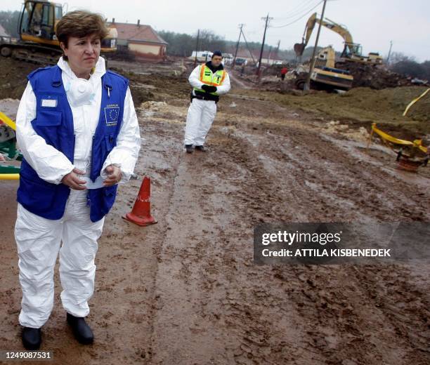 European Commissioner for International Cooperation, Humanitarian Aid and Crisis Response Kristalina Georgieva of Bulgaria looks at the ruptured...