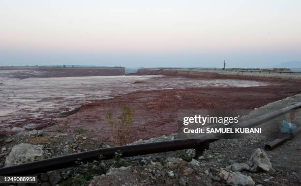 View dated on October 10, 2010 shows the ruptured reservoir wall at the Ajka Timfoldgyar plant in Kolontar, 160kms southwest of Budapest, which...