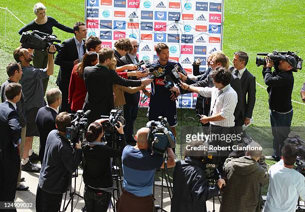 Harry Kewell of the Victory talks to the media after a Melbourne Victory A-League training session at Olympic Park on September 14, 2011 in...