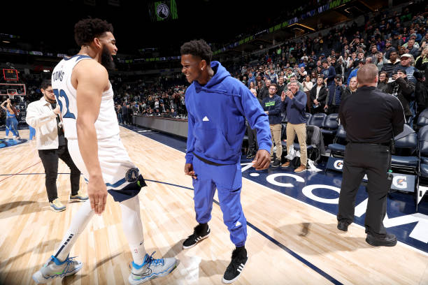 Karl-Anthony Towns and Anthony Edwards of the Minnesota Timberwolves celebrate after the game against the Atlanta Hawks and on March 22, 2023 at...