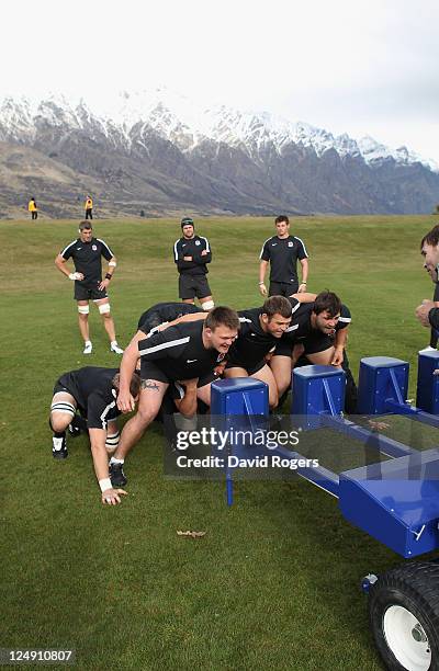 David Wilson, Lee Mears and Alex Corbisiero the England front row practise scrummaging during an England IRB Rugby World Cup 2011 training session at...