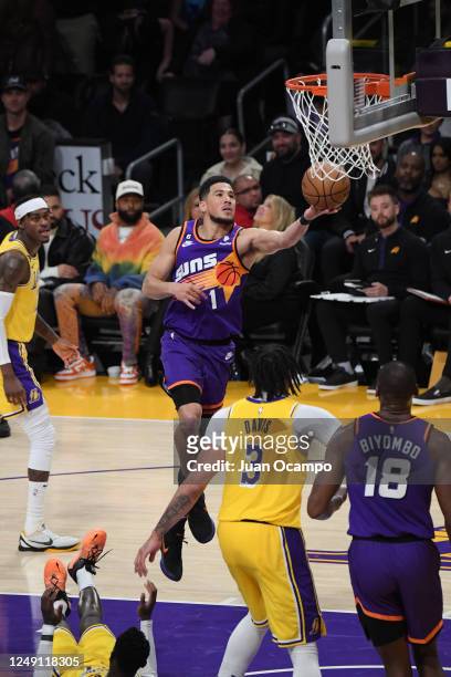 Devin Booker of the Phoenix Suns drives to the basket during the game against the Los Angeles Lakers on March 22, 2023 at Crypto.Com Arena in Los...