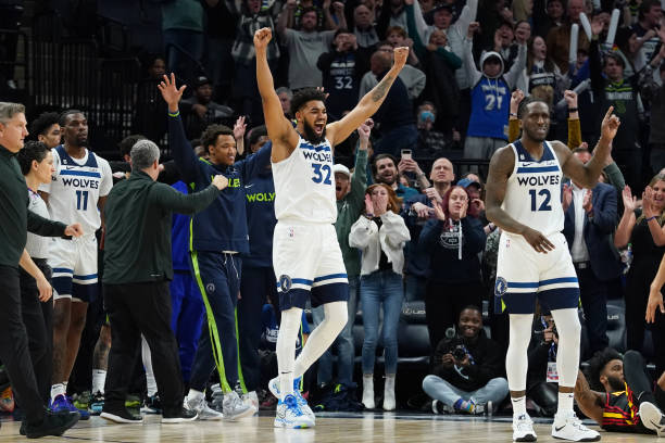 Karl-Anthony Towns of the Minnesota Timberwolves celebrates during the game against the Atlanta Hawks on March 22, 2023 at Target Center in...