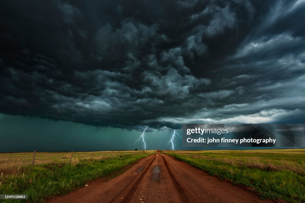 Double Lightning bolts over agricultural land. USA