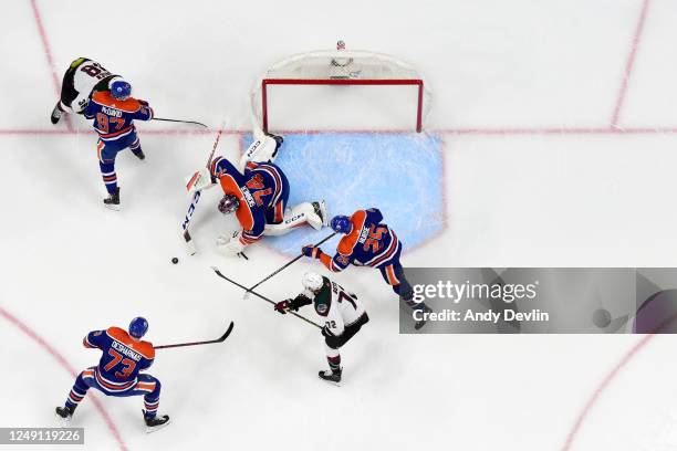 Stuart Skinner of the Edmonton Oilers makes a save during the game against the Arizona Coyotes on March 22, 2023 at Rogers Place in Edmonton,...